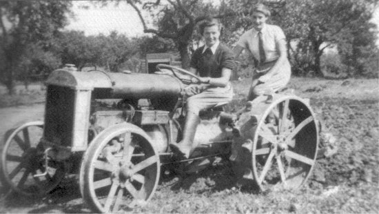 Tilly? and Ruth Lamdin driving a tractor