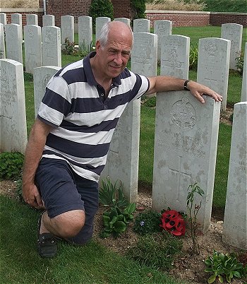 Mick Roberts at his great uncle's gravestone